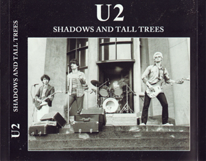 U2 shadows and tall trees
